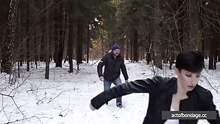 Barefoot Claudia is captured in the cold winter forest